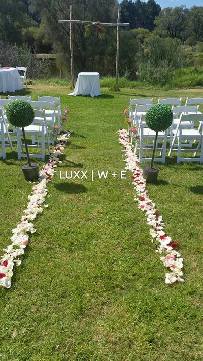 Beautiful rustic ceremony styling by Luxx Weddings & Events, elite event stylist with work feature in the  media. 